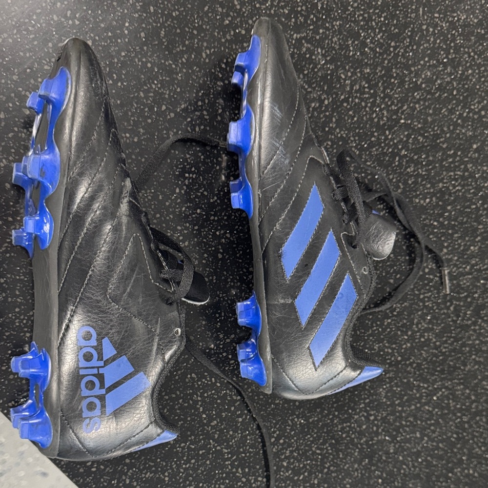 Adidas Black Cleats with Blue Accents